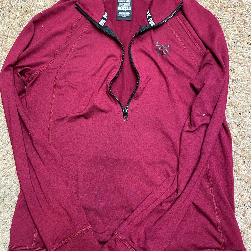 Pink athletic sweater
